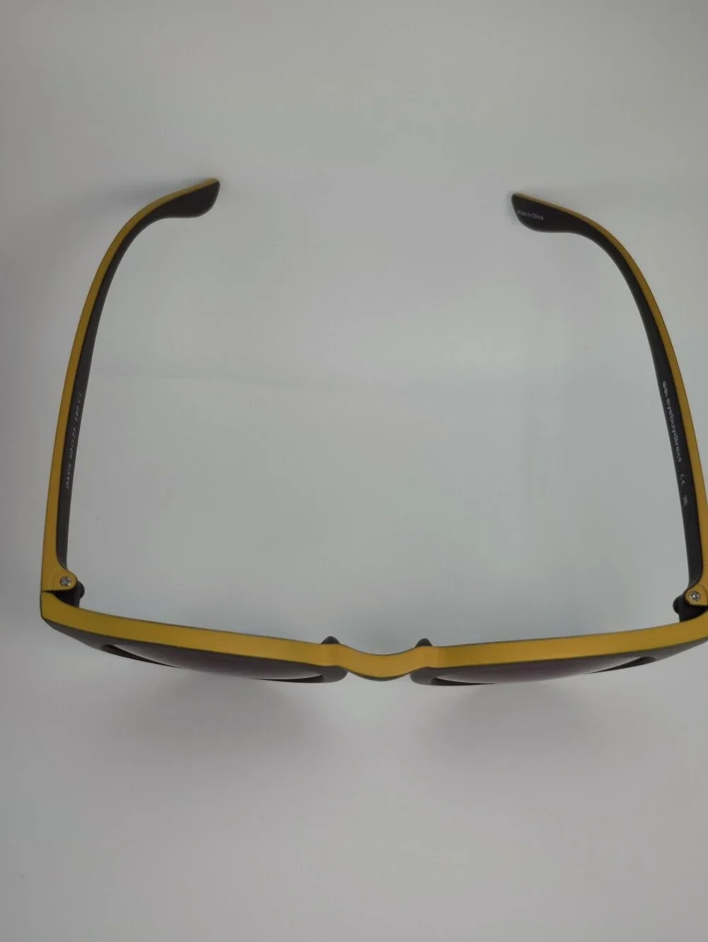 Oasis. Men's Black Round Frame. Deep Chocolate, Yellow Top.